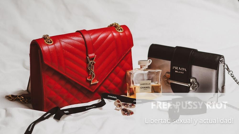 red and black leather handbag